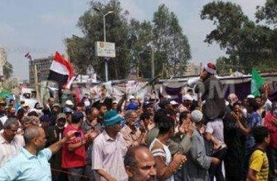مسيرة لمؤيدي الشرعية تطوف رابعة العداوية.jpg